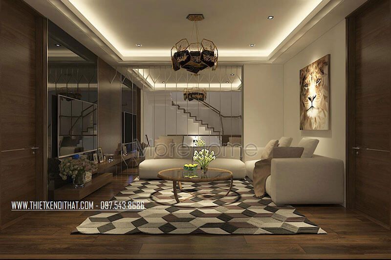 Sử dụng bức tường gương kính ở phòng khách giúp khuôn dung diện tích phòng một cách rộng lớn hơn.